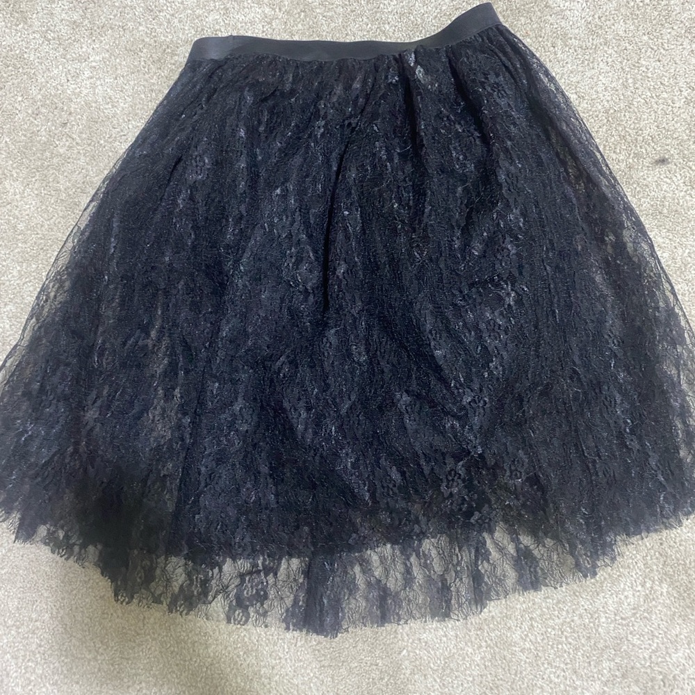 a black knee length black skirt. I had 2 layers and designs on the 1st layer.